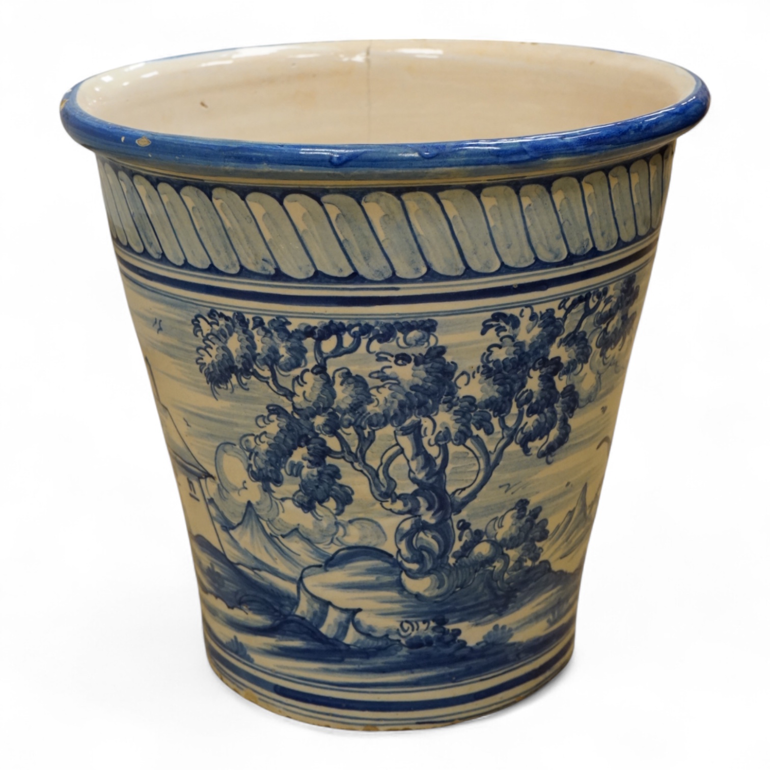 A maiolica glazed planter, 30cm high